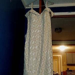 Cream and gold thigh high dress worn once perfect condition sips up in back